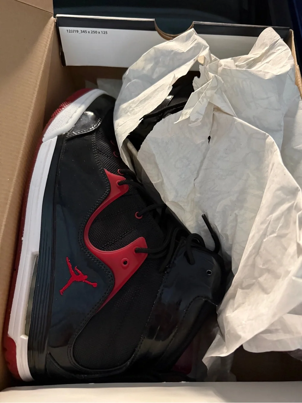 Jordan Men's Black and Red High-Top Sneakers